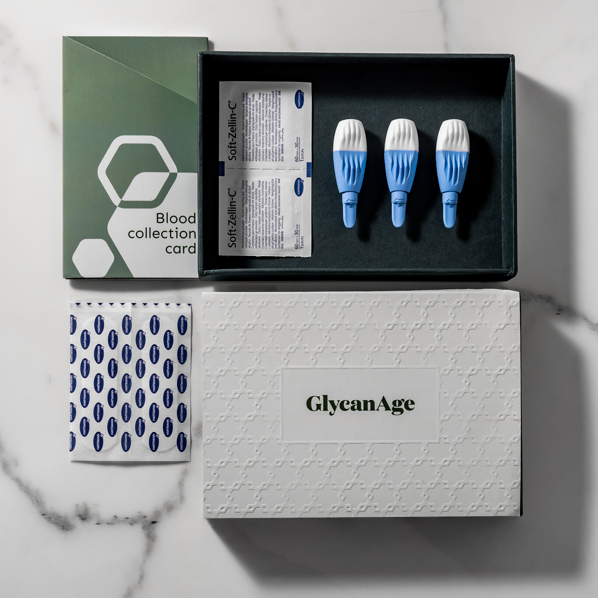 GlycanAge Comprehensive AGE Testing Kit, biological age test components, and blood collection card.